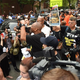 A protestor shouts outside the funeral service for Eric Garner at Bethel Baptist Church in Brooklyn, N.Y., on July 23, 2014.
TIMOTHY A. CLARY/AFP/Getty Images